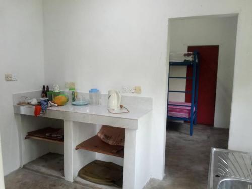Kuchyň nebo kuchyňský kout v ubytování EECS Transit and Budget Homestay