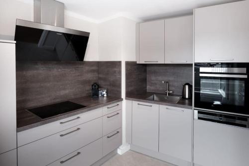 Η κουζίνα ή μικρή κουζίνα στο Luxury Apartment 8 Pax