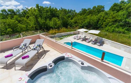 a swimming pool on the roof of a house at Villa Liv in Pula