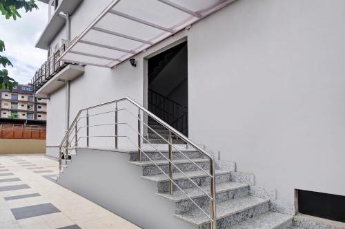 a set of stairs leading up to a building at Super Collection O ISBT in Guwahati