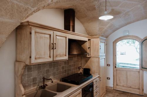 Kuchyň nebo kuchyňský kout v ubytování VinTage rooms