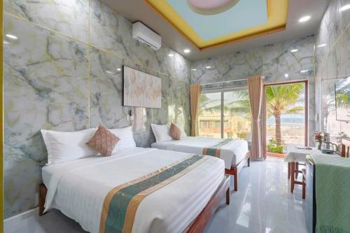 Ένα ή περισσότερα κρεβάτια σε δωμάτιο στο Khách sạn Nguyệt Minh2