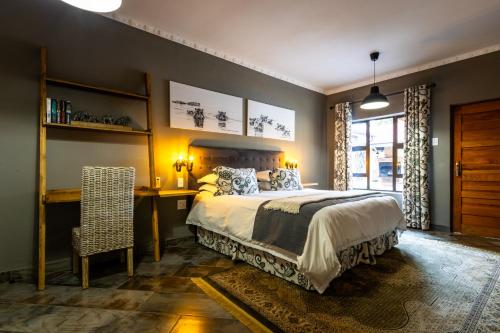 Postel nebo postele na pokoji v ubytování Hornbill Family Suites