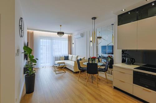 Η κουζίνα ή μικρή κουζίνα στο GOLD Apartment Uniejów
