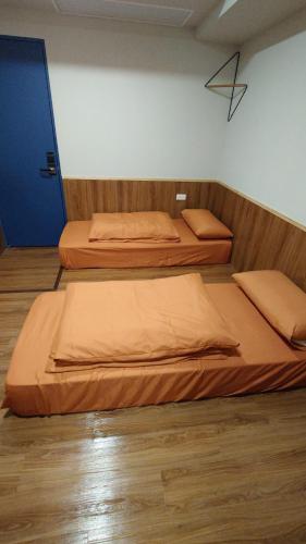 Postel nebo postele na pokoji v ubytování Formosa 101