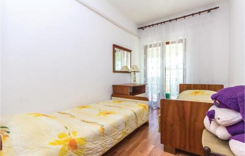 Letto o letti in una camera di Beautiful Apartment In Sisan With Wifi