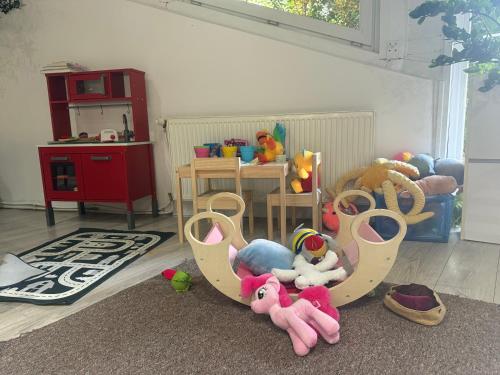 a childs play area with stuffed animals and toys at Penzion Set in Košice