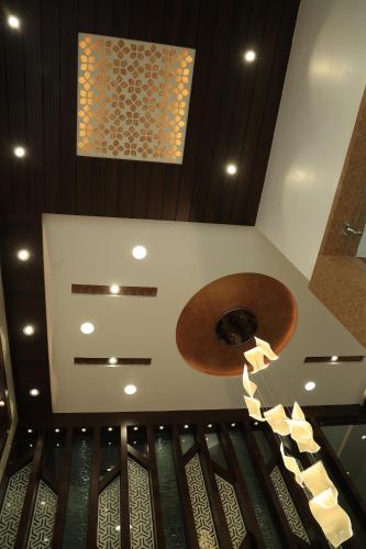 an overhead view of a music room with a guitar at HOTEL TAIKA in Rāmeswaram