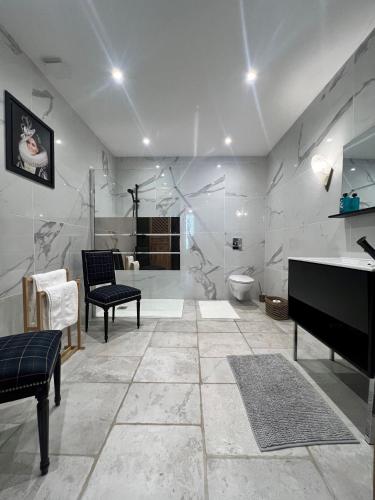 a bathroom with a sink and a toilet at Villa Pauline in Avignon