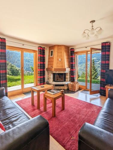 Posezení v ubytování Paisible apt cheminée, terrasse, jardin, vue époustouflante