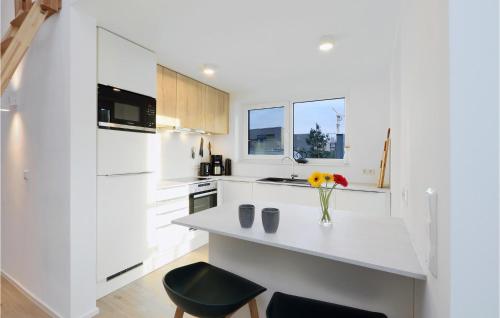 Η κουζίνα ή μικρή κουζίνα στο Nice Home In Lembruchdümmer See