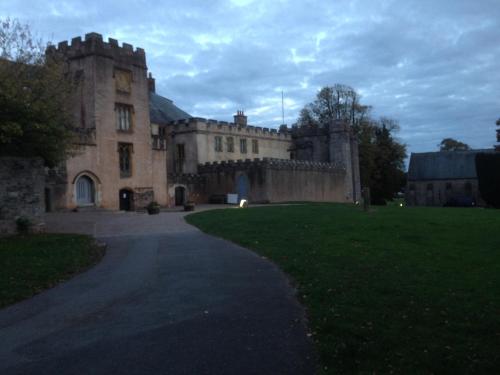 an old castle with a path leading to it at The Brandize Guest House in Torquay