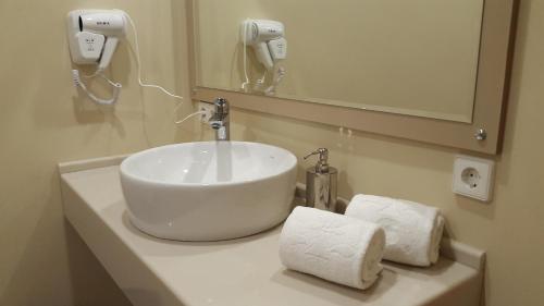 Koupelna v ubytování Monte Hotel