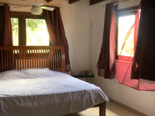 Ein Bett oder Betten in einem Zimmer der Unterkunft Alecrim Hostel e Pousada