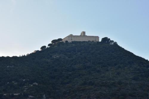 a building on top of a hill at Casa Vacanze Luxury House Cassino in Cassino