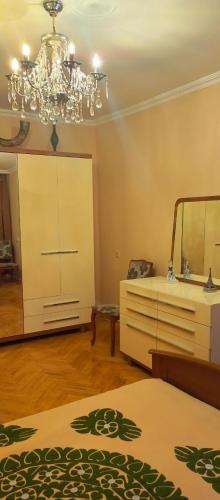 Gulta vai gultas numurā naktsmītnē Space Apartment