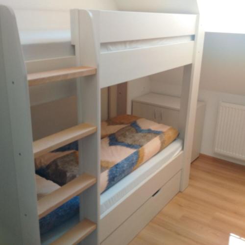 Postel nebo postele na pokoji v ubytování Hostel pod Krivanom