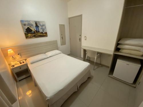 Ideal Praia Hotelにあるベッド