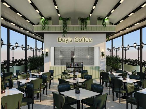 a rendering of a days coffee restaurant with tables and chairs at Days Inn by Wyndham Alanya in Alanya
