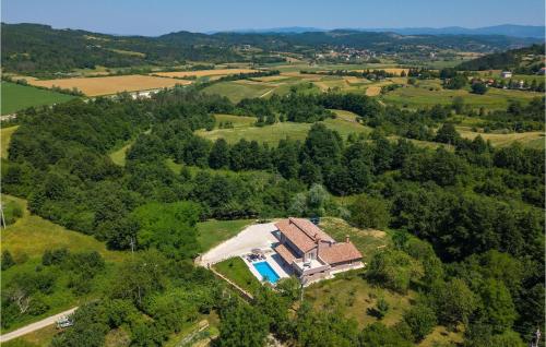 an aerial view of a house on a hill at Villa Zamari in Zarečje