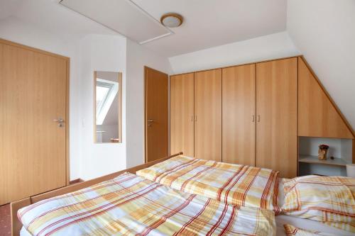 Katil atau katil-katil dalam bilik di Ferienwohnung H H Ingwersen