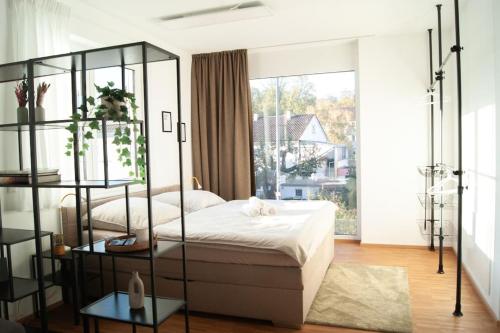Katil atau katil-katil dalam bilik di Studio Apartment Marbach