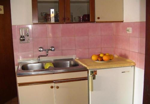 Kuchyň nebo kuchyňský kout v ubytování Apartments Nebo