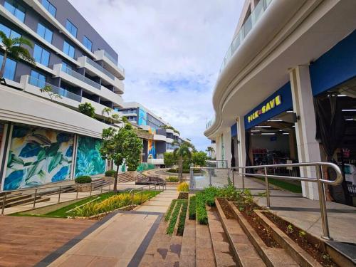 a street in a building with a shopping mall at Evelyn's Azure Escapes at Boracay Newcoast in Boracay