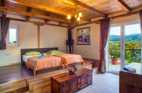 Ένα ή περισσότερα κρεβάτια σε δωμάτιο στο Lefkas Blue Residence