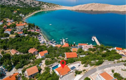 an aerial view of a small town next to a body of water at Awesome Home In Lukovo in Lukovo