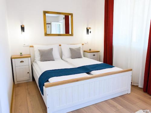 Giường trong phòng chung tại Cozy Rooms