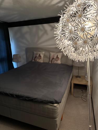 Una cama o camas en una habitación de Sehr Schöne Wohnung in Engelberg