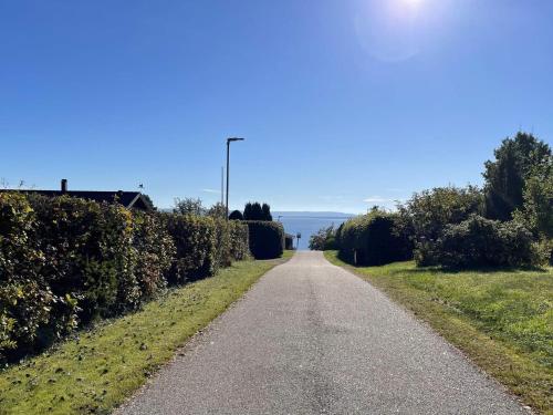 a road with a street light on the side of it at 4 person holiday home in Frändefors in Frändefors
