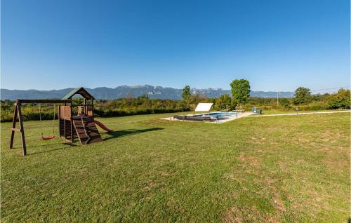 a park with a playground and a swing set at Beautiful Home In Sveti Rok in Sveti Rok