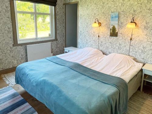 Postel nebo postele na pokoji v ubytování 6 person holiday home in BORGHOLM