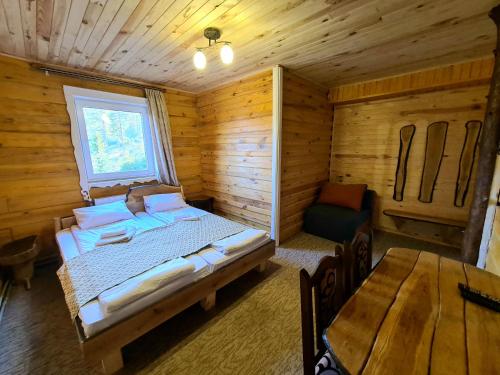 Postel nebo postele na pokoji v ubytování Alpin Eco Chalet & Wellness