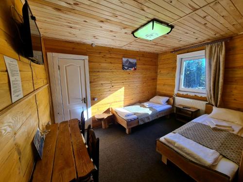 Postel nebo postele na pokoji v ubytování Alpin Eco Chalet & Wellness