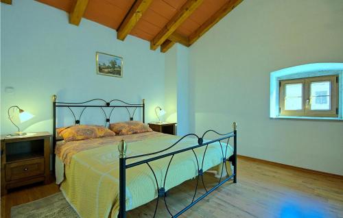 Ένα ή περισσότερα κρεβάτια σε δωμάτιο στο Casa Nadija