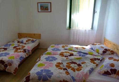 Postel nebo postele na pokoji v ubytování House Villa Jadran