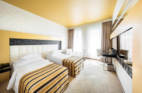 Katil atau katil-katil dalam bilik di Grandior Hotel Prague