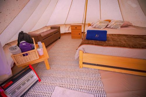Postel nebo postele na pokoji v ubytování Praderas Los Peumos Glamping-Cabañas