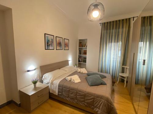 Postel nebo postele na pokoji v ubytování Appartamento in centro