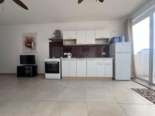Η κουζίνα ή μικρή κουζίνα στο Newly Listed Penthouse in Msida