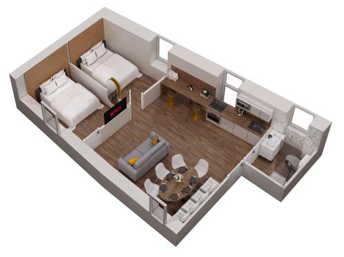 a floor plan of a room with a bed and couch at Pin * Spacieux * Linge hôtelier * Fibre * Confort in La Destrousse