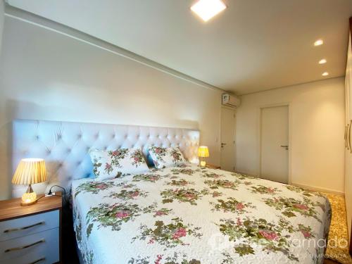 Ένα ή περισσότερα κρεβάτια σε δωμάτιο στο Belluno Boulevard Canela