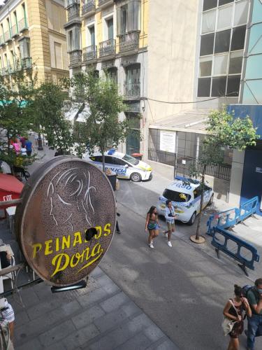 a sign on the side of a city street at Estudio 504 M-15 in Madrid
