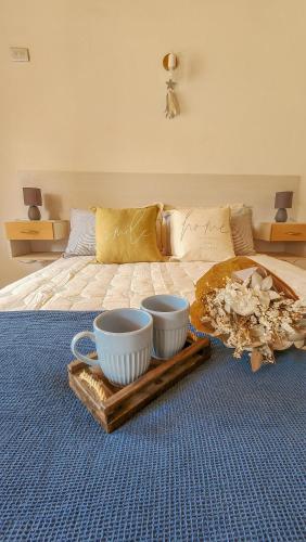 En eller flere senge i et værelse på Tierra Patagonica Departamentos