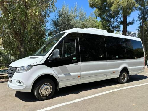 a white van parked in a parking lot at Village Camping Santa Fortunata - Campogaio in Sorrento