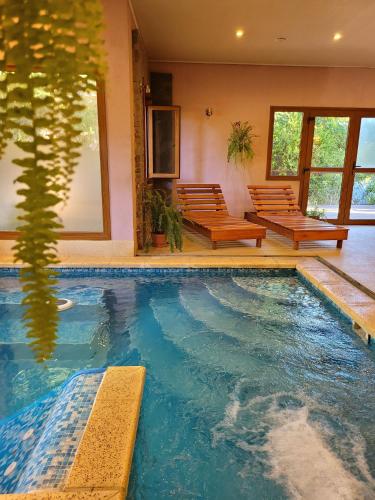 Πισίνα στο ή κοντά στο Aparts chalet Alquimia