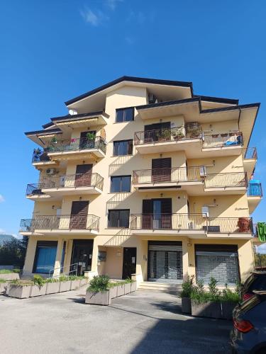 a tall apartment building with balconies on it at Interamna Dreams in Pignataro Interamna